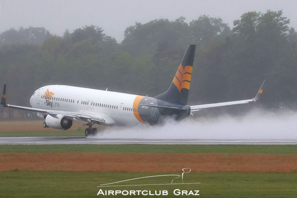 Skyline Express Airline Boeing 737-94XER UR-SLX